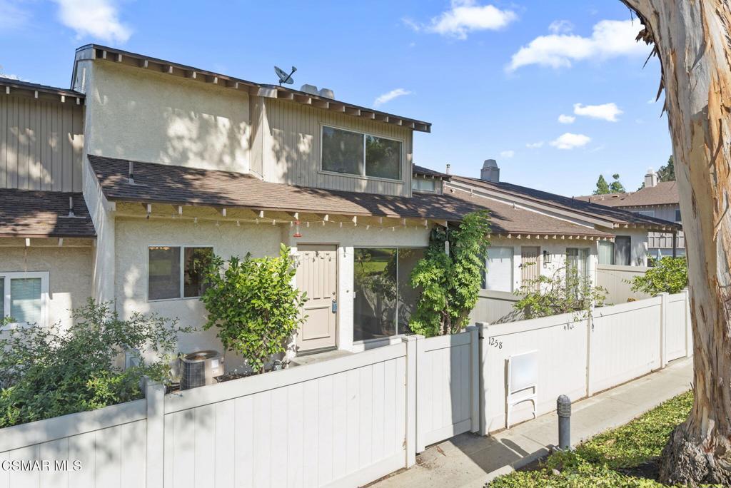 1258 Ramona Drive Newbury Park, CA 91320 - Photo 2 of 51 a view of a white building among the front of house