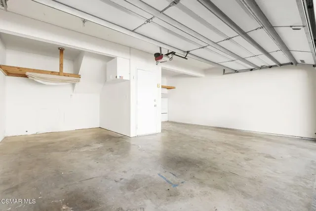 a view of a house with a garage