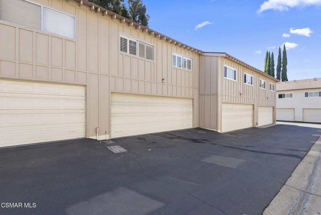 1258 Ramona Drive Newbury Park, CA 91320 - Photo 31 of 51 a view of a house with a garage