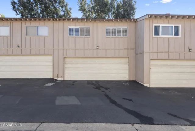 a view of a house with a garage