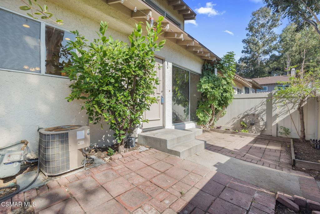 1258 Ramona Drive Newbury Park, CA 91320 - Photo 4 of 51 a white house with trees in front of it