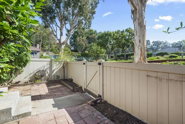 a view of a porch with a tree