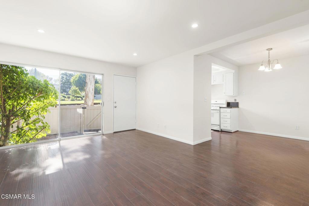 1258 Ramona Drive Newbury Park, CA 91320 - Photo 9 of 51 a view of a kitchen with wooden floor and a window