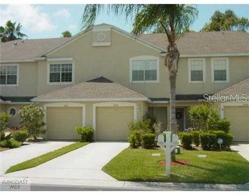 front view of a house and a yard
