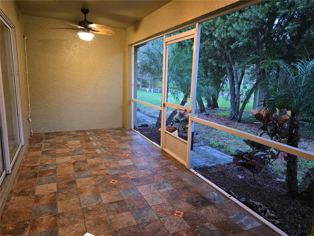 11229 Kapok Grand Circle Madeira Beach, FL 33708 - Photo 17 of 23 a very nice looking house with a large window