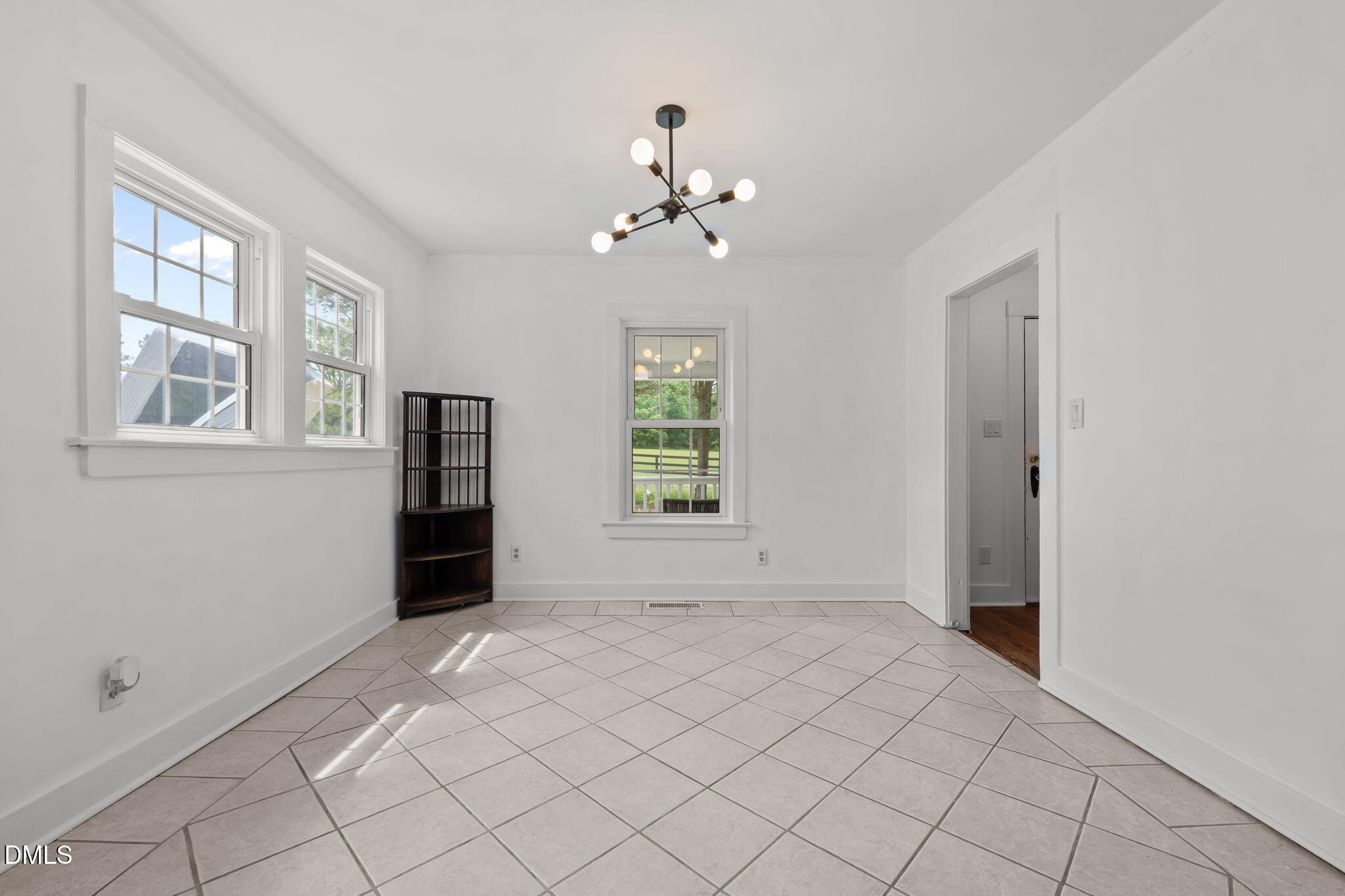 8718 Moody Road Liberty, NC 27298 - Photo 12 of 52 a view of an empty room with a window