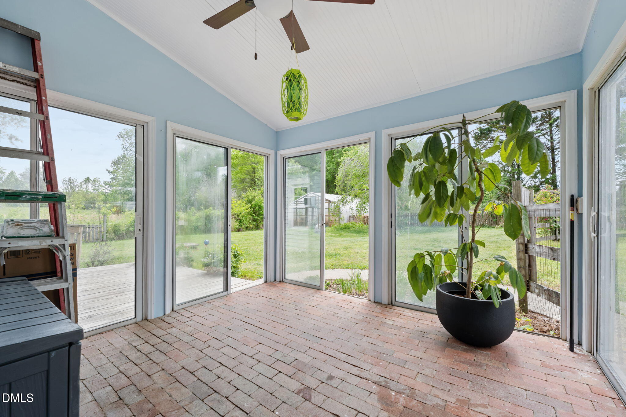 8718 Moody Road Liberty, NC 27298 - Photo 13 of 52 a view of a living room and windows