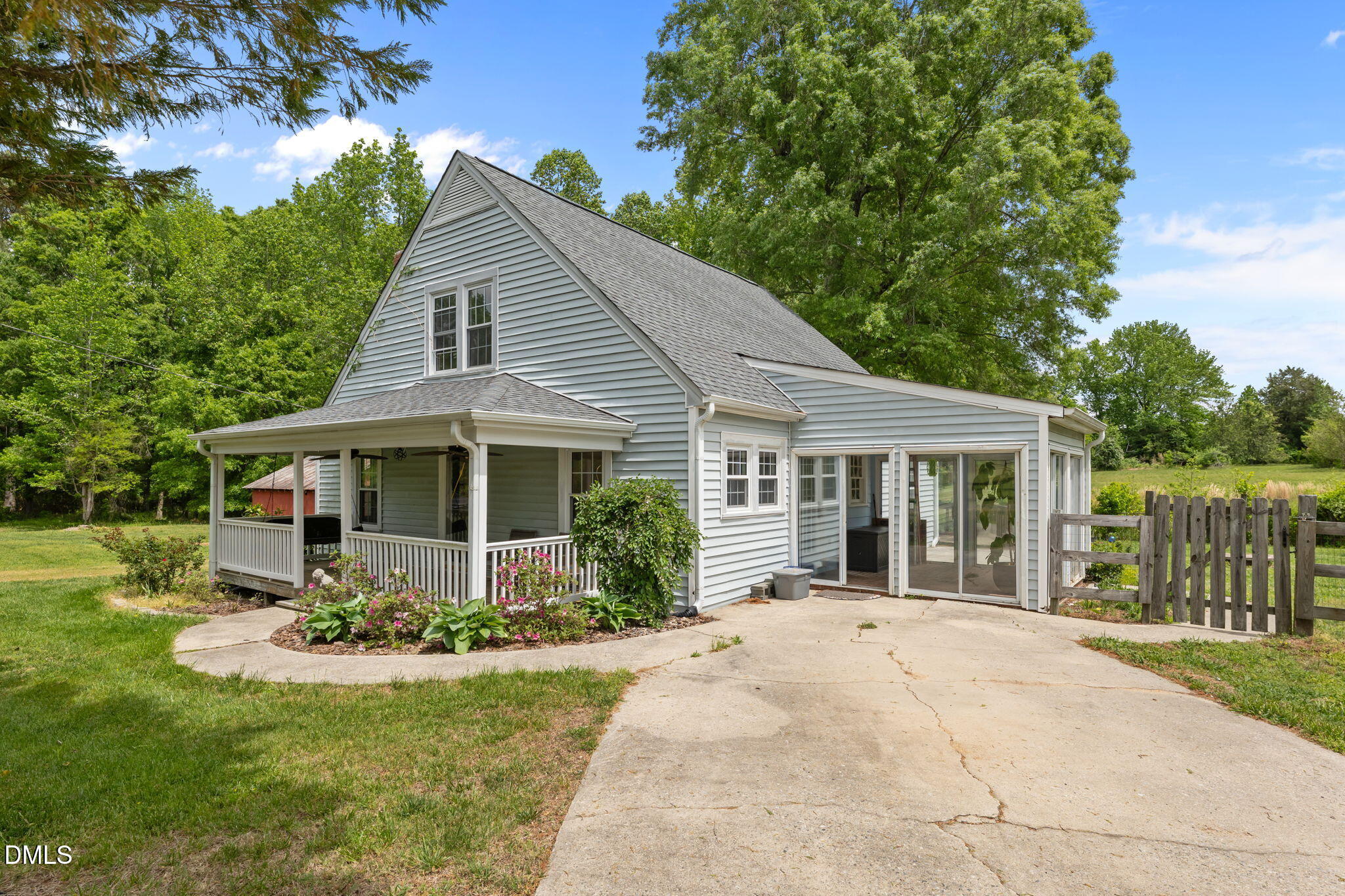 8718 Moody Road Liberty, NC 27298 - Photo 29 of 52 a front view of a house with a yard