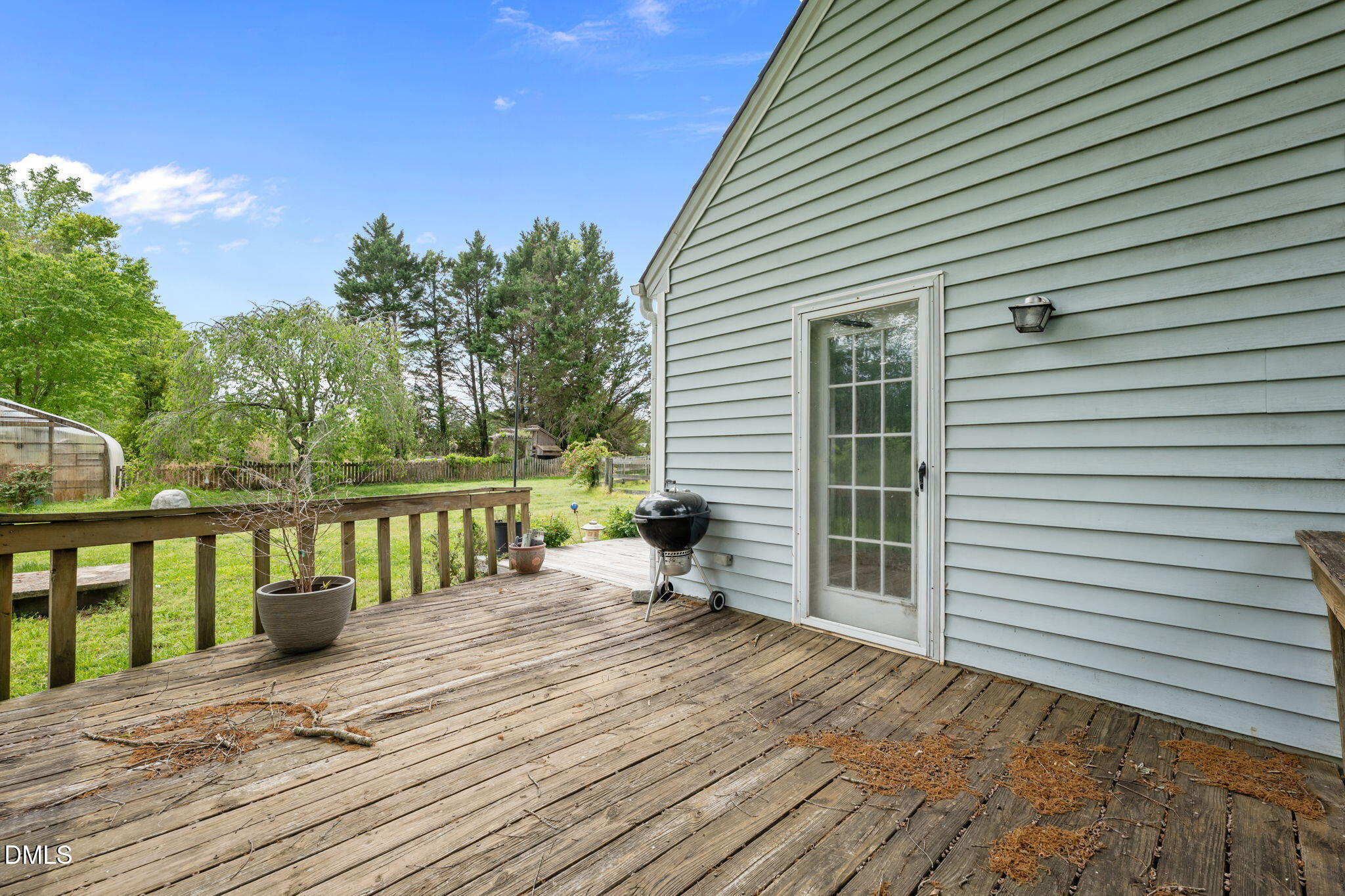 8718 Moody Road Liberty, NC 27298 - Photo 36 of 52 a view of a two chairs on the deck