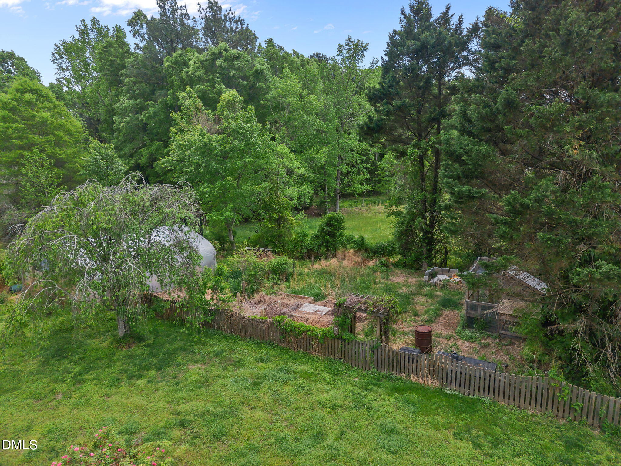 8718 Moody Road Liberty, NC 27298 - Photo 50 of 52 an aerial view of residential house with outdoor space and trees all around