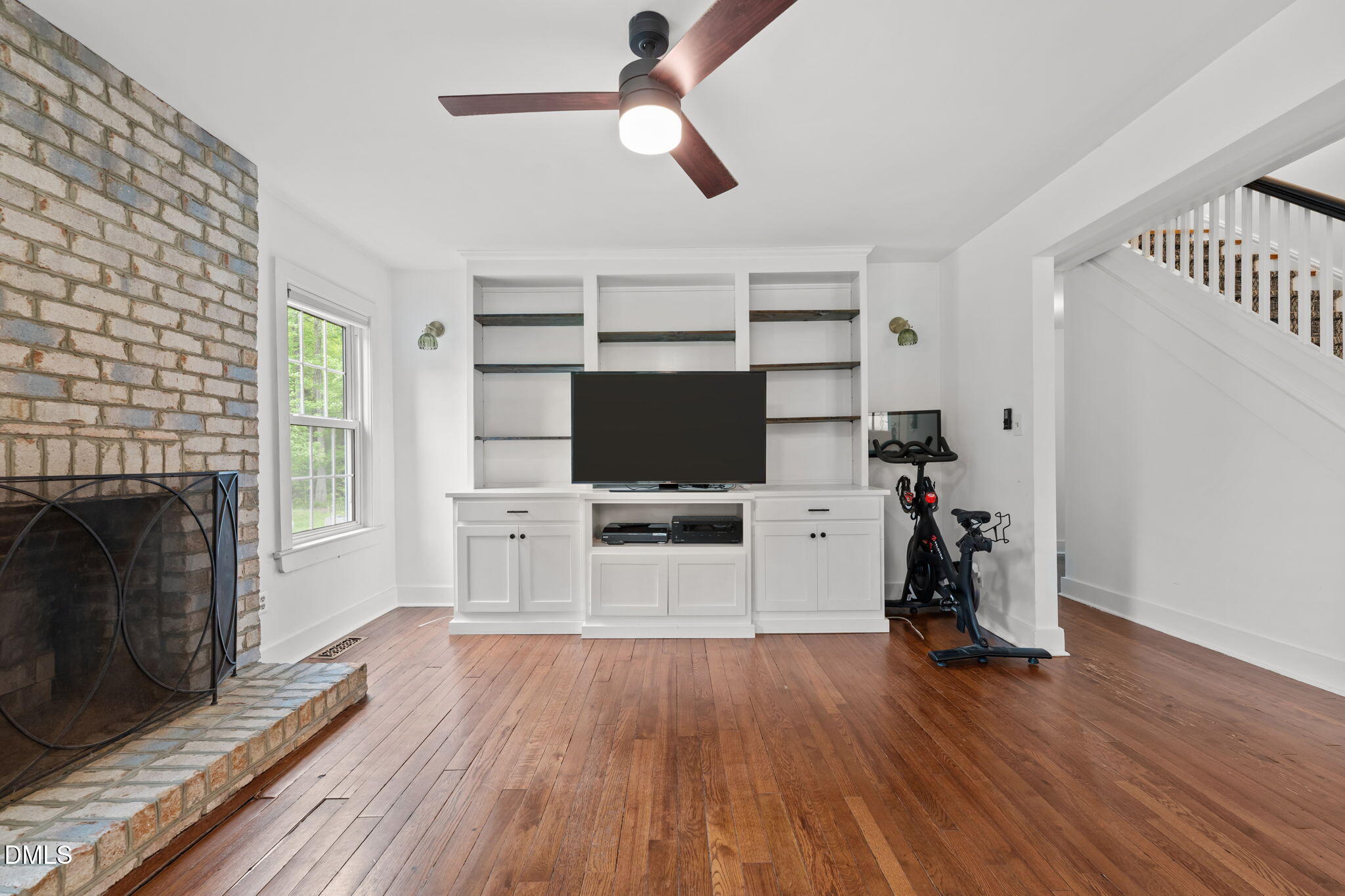 8718 Moody Road Liberty, NC 27298 - Photo 5 of 52 a living room with furniture and a flat screen tv