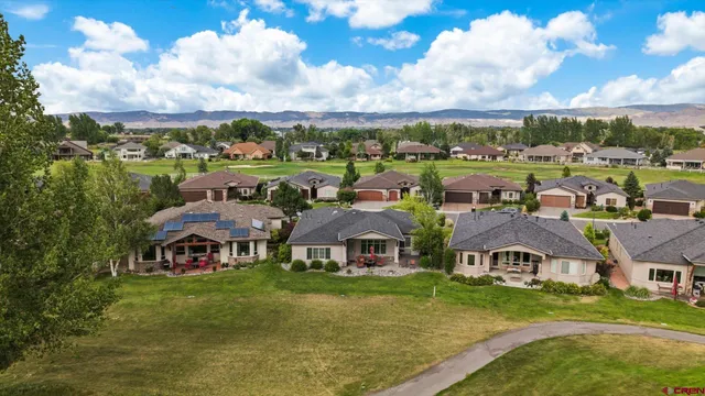 an aerial view of a house with garden space