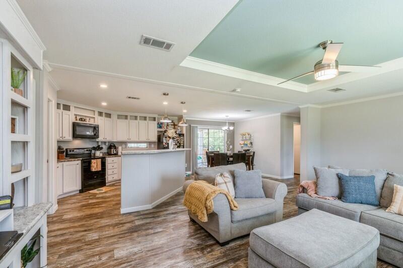 4488 Creek Road Vernon, FL 32462 - Photo 9 of 35 a living room with furniture and kitchen view
