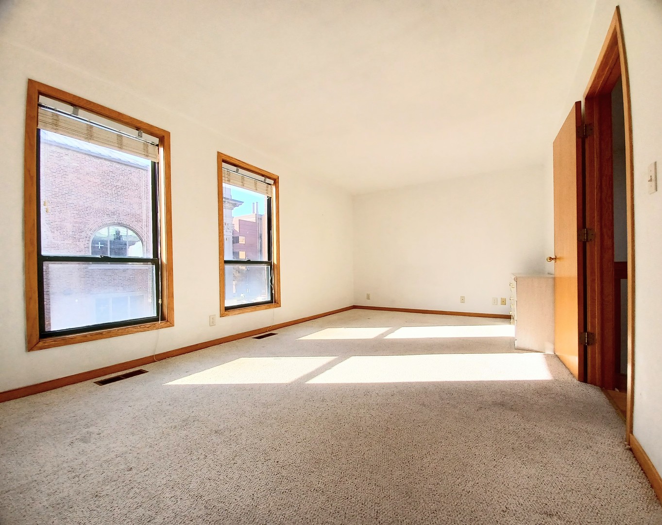 727 South Ashland Avenue, Unit D Chicago, IL 60607 - Photo 17 of 32 a view of a room with a large window
