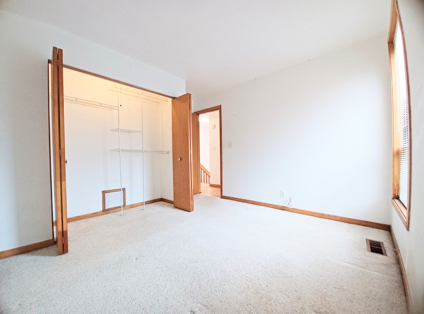 727 South Ashland Avenue, Unit D Chicago, IL 60607 - Photo 23 of 32 an empty room with windows