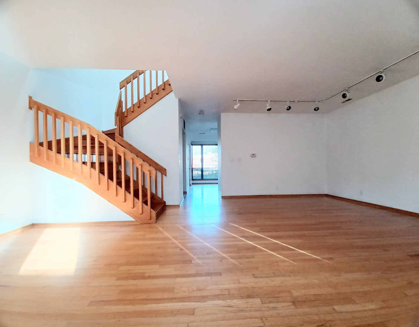 727 South Ashland Avenue, Unit D Chicago, IL 60607 - Photo 6 of 32 a view of an entryway with wooden floor