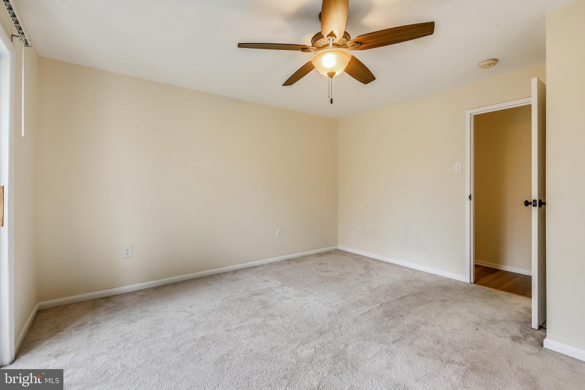 2572 Riva Road, Unit 9B Annapolis, MD 21401 - Photo 21 of 36 an empty room with a fan and a fan