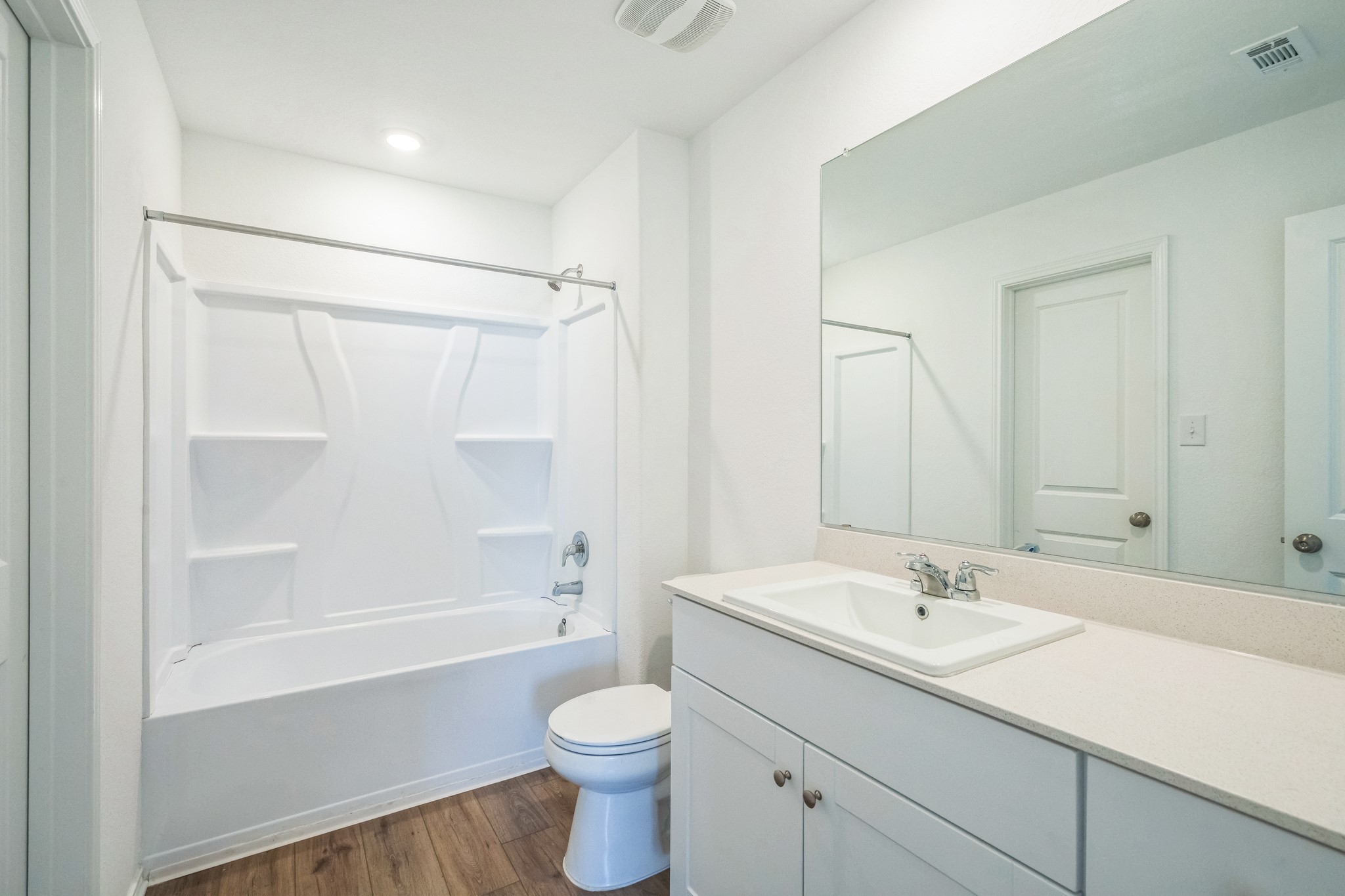505 Sergeant Murphy Road Jarrell, TX 76537 - Photo 9 of 16 a bathroom with a sink toilet a mirror and shower