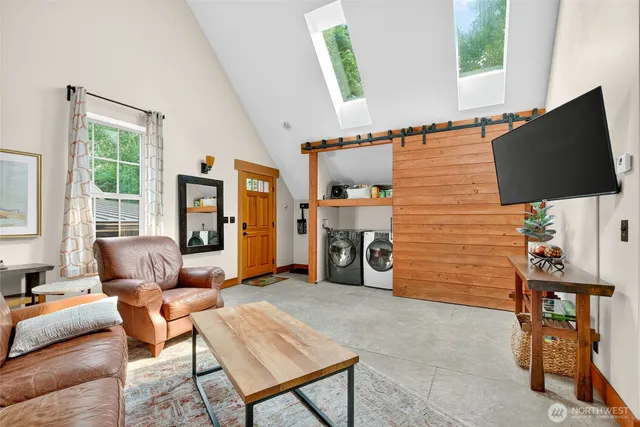 a bedroom with a bed and a table