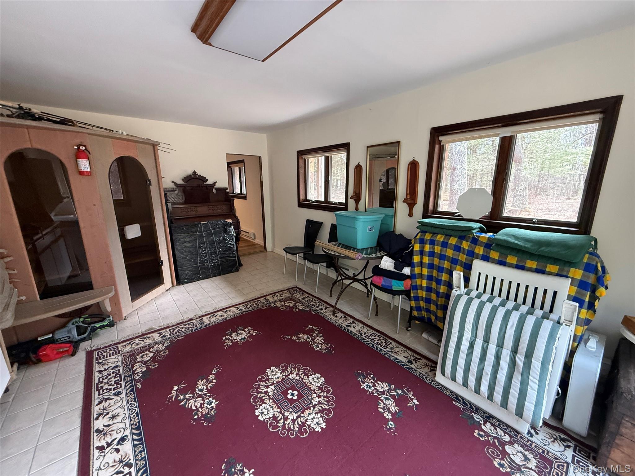 1441 Ulster Heights Road Ellenville, NY 12428 - Photo 13 of 35 a view of a livingroom with furniture and windows