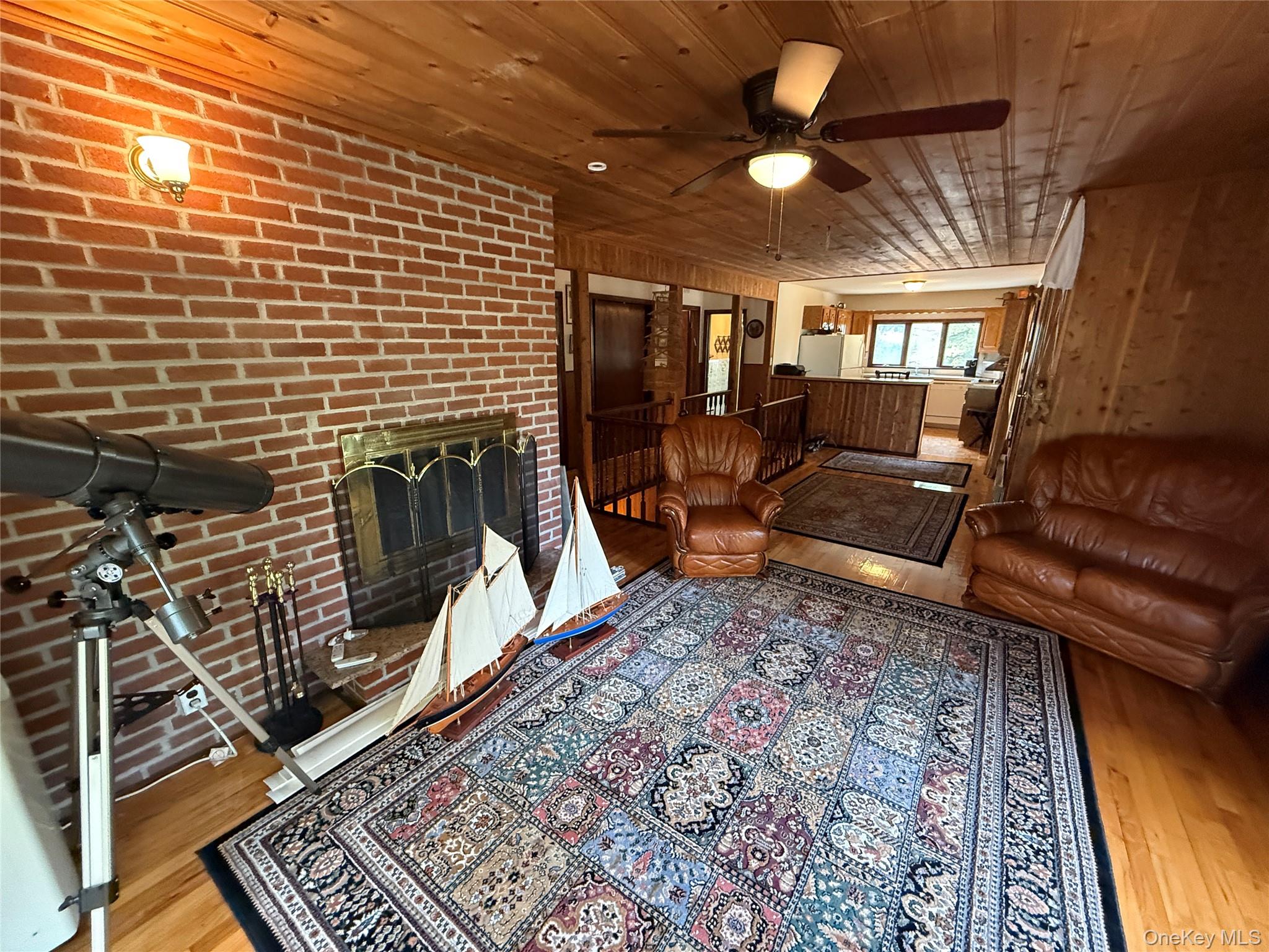 1441 Ulster Heights Road Ellenville, NY 12428 - Photo 18 of 35 a living room with furniture and a rug