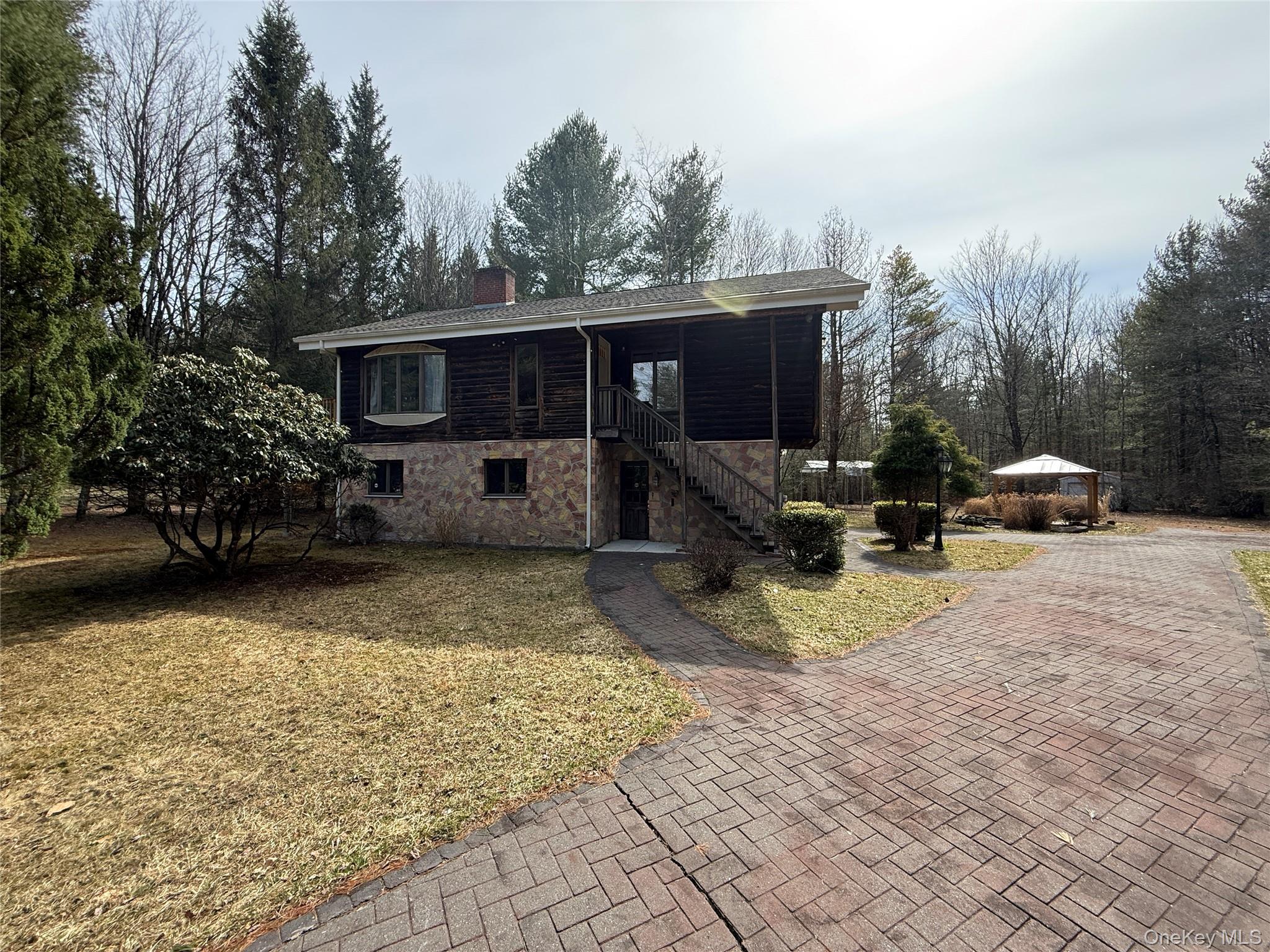 1441 Ulster Heights Road Ellenville, NY 12428 - Photo 2 of 35 a view of a house with backyard and sitting area