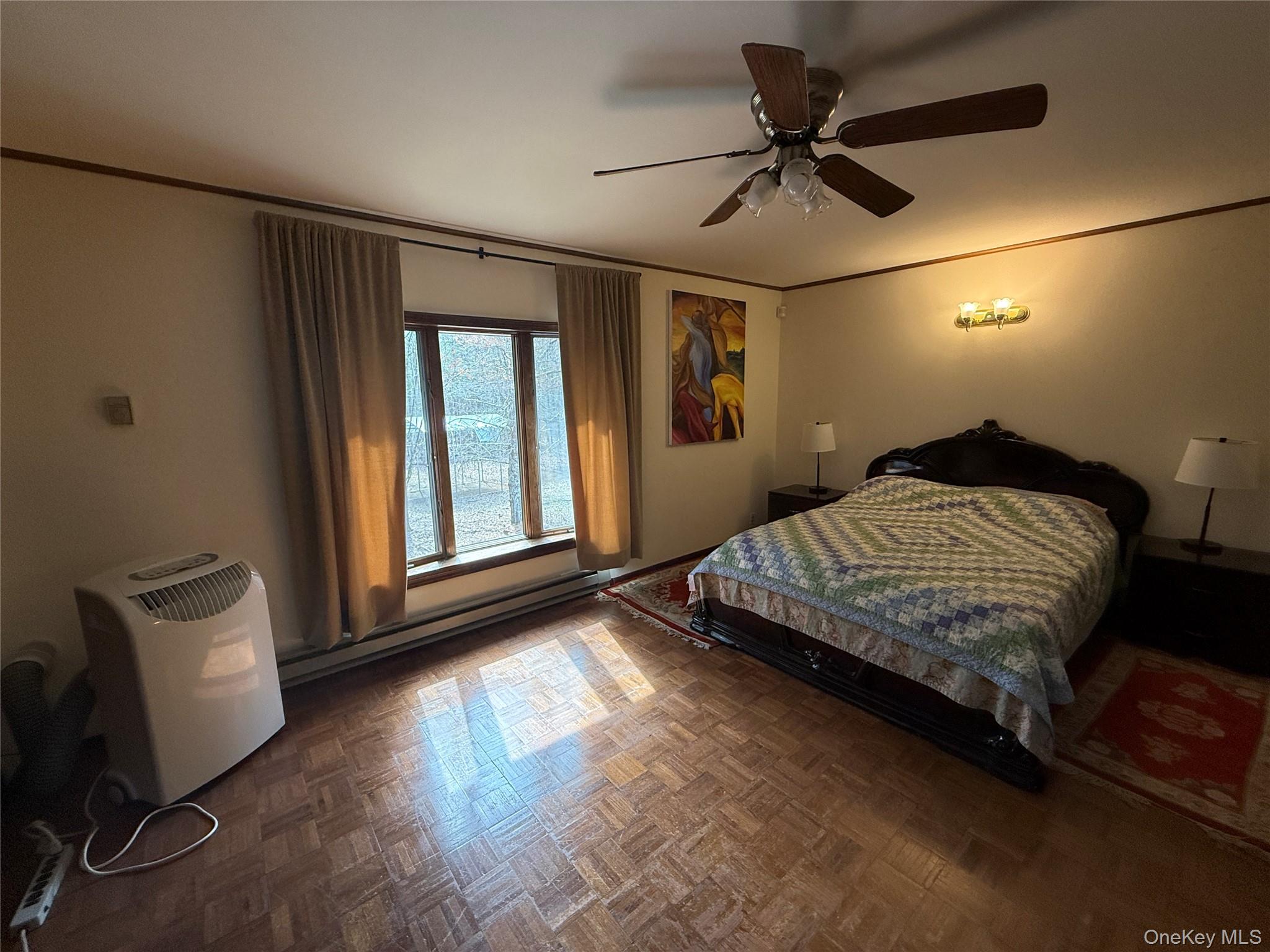 1441 Ulster Heights Road Ellenville, NY 12428 - Photo 26 of 35 a bedroom with a bed and window