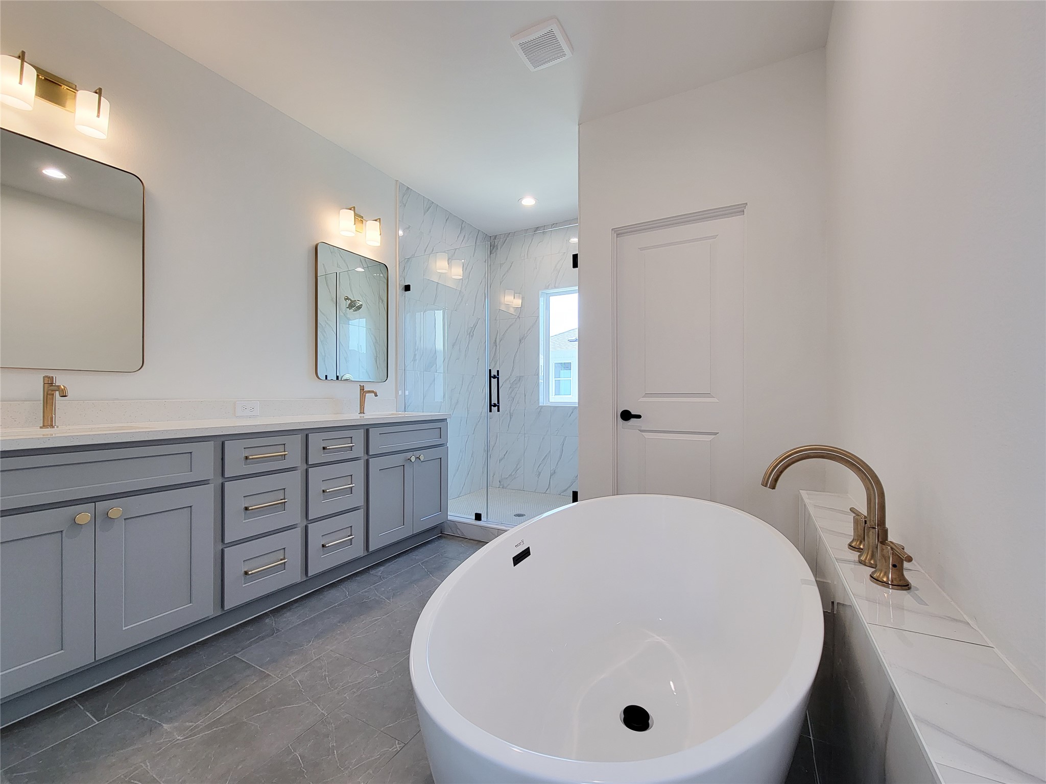 7705 Earl Rudder Way Houston, TX 77055 - Photo 16 of 39 a bathroom with a sink and a mirror