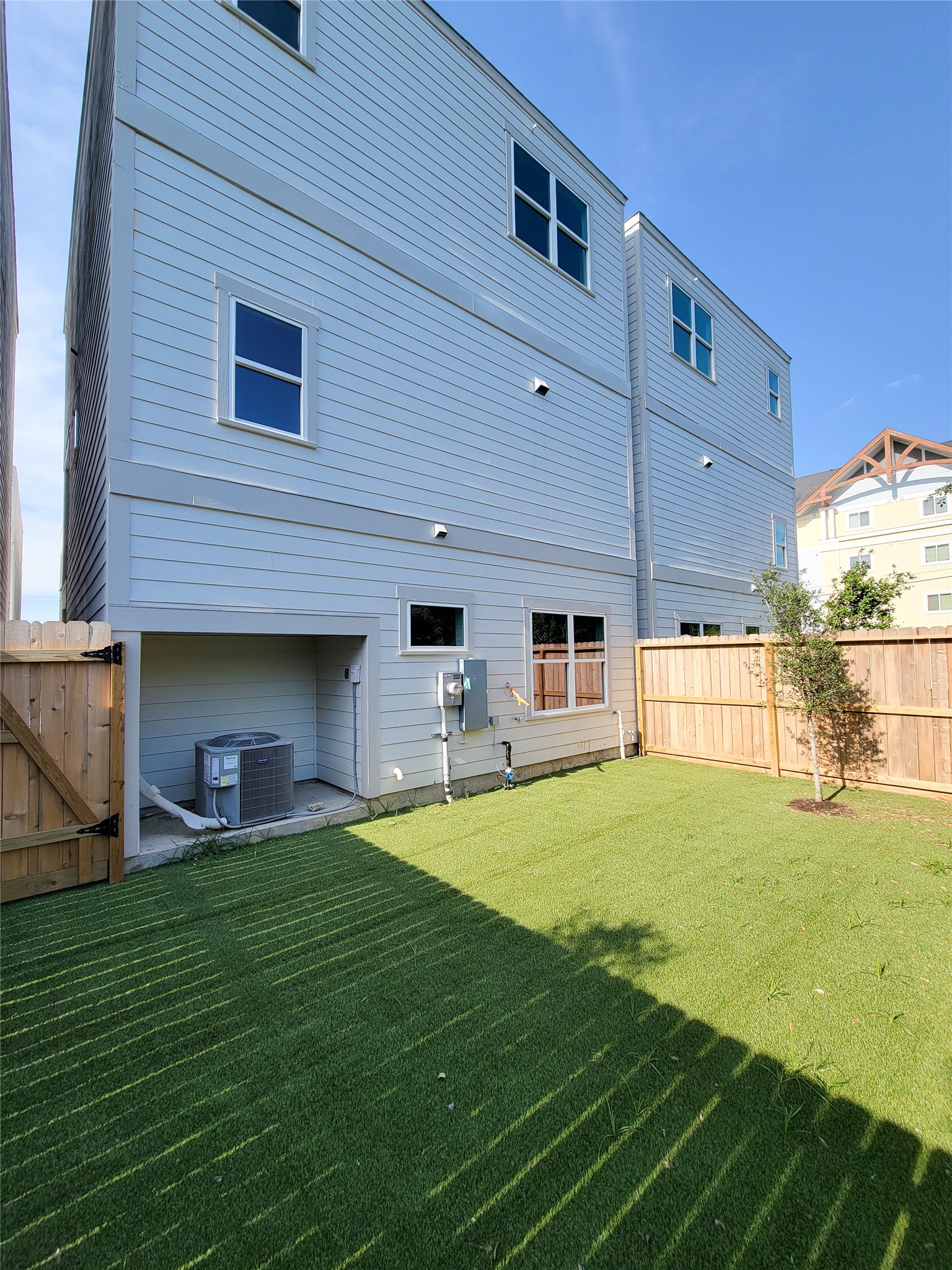 7705 Earl Rudder Way Houston, TX 77055 - Photo 2 of 39 a house view with a sitting space and garden