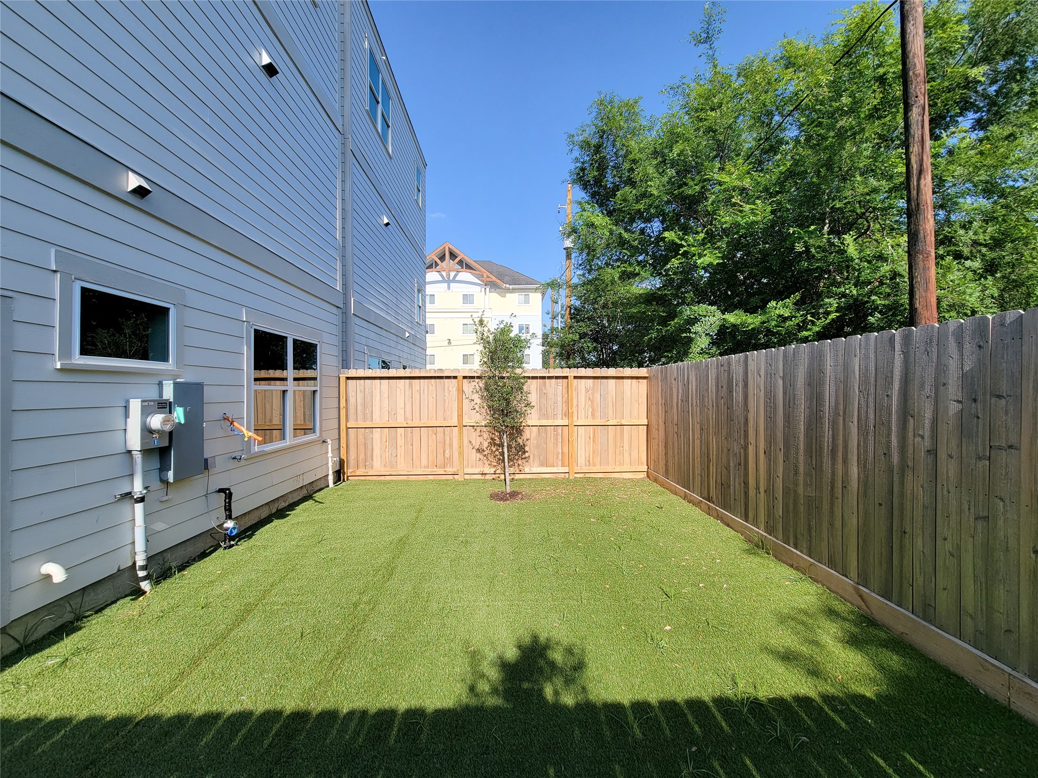 7705 Earl Rudder Way Houston, TX 77055 - Photo 3 of 39 a view of a backyard