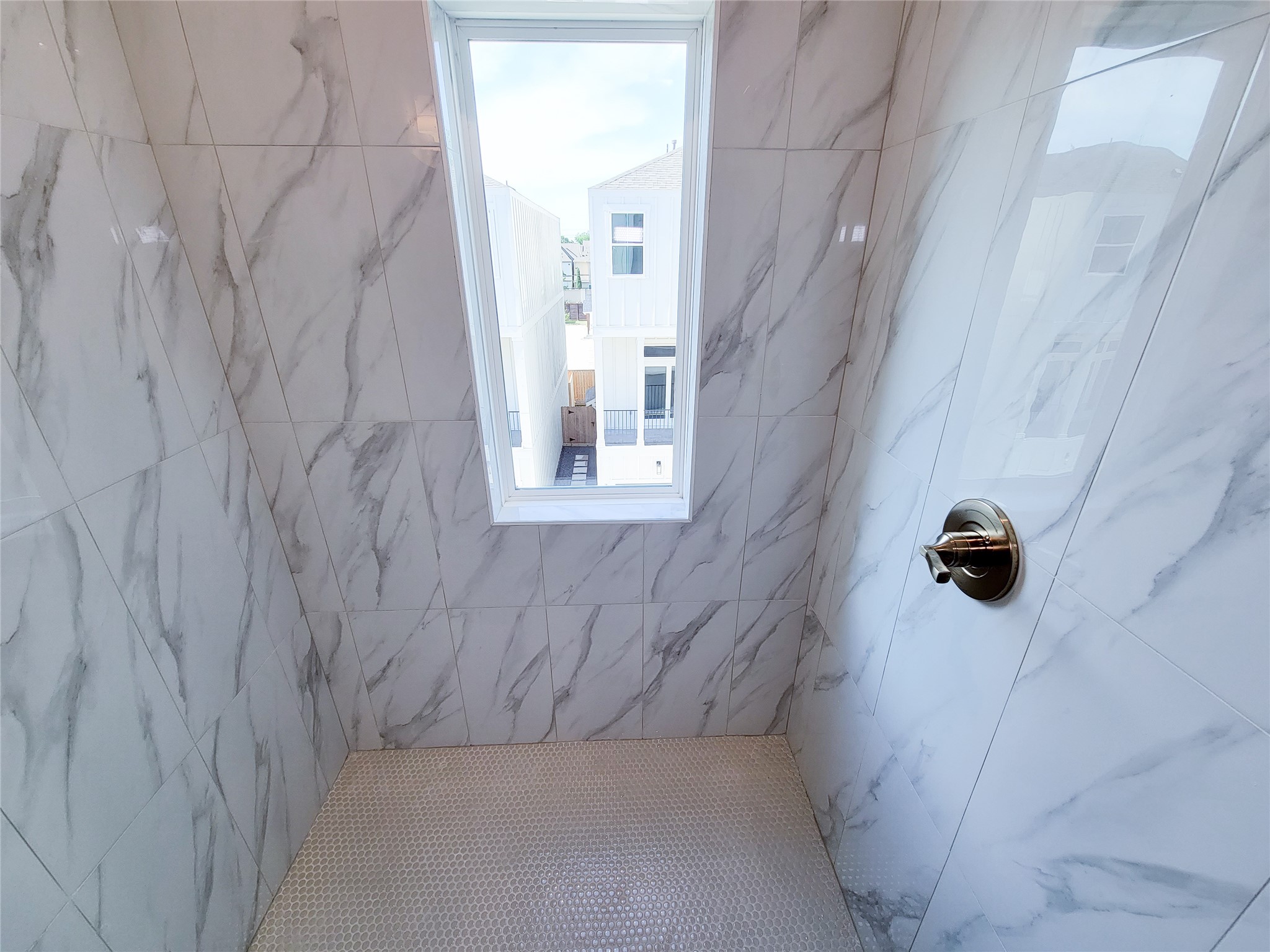 7705 Earl Rudder Way Houston, TX 77055 - Photo 8 of 39 a bathroom with a shower