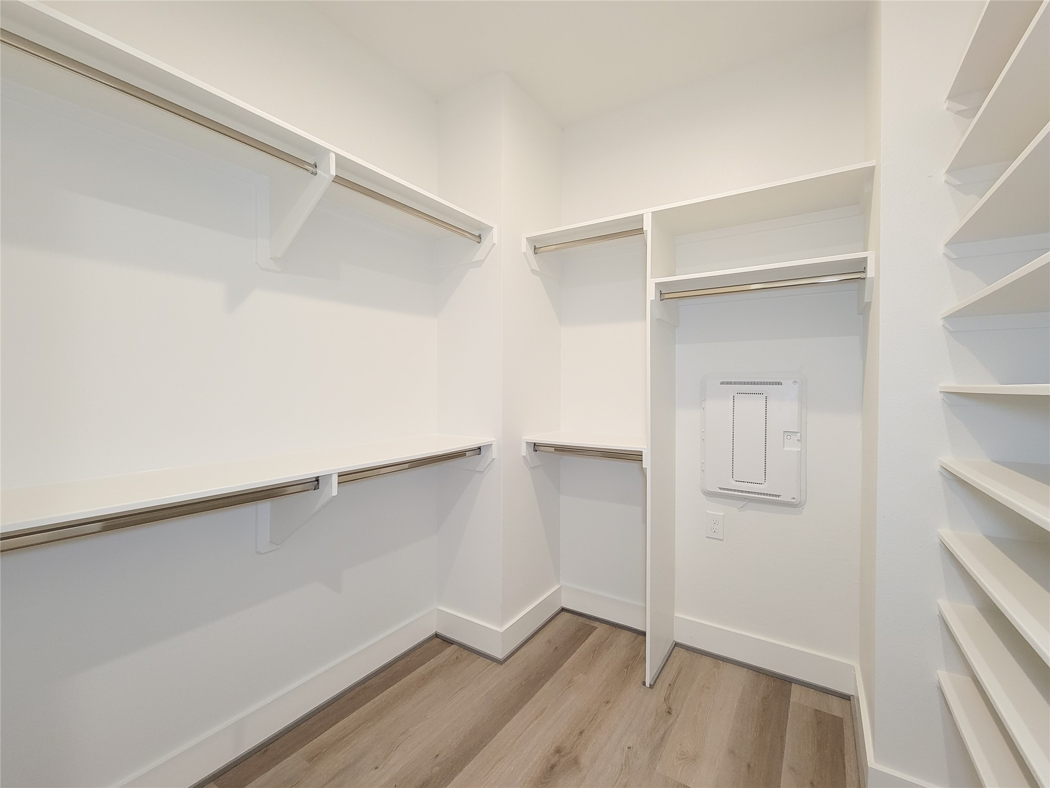 7705 Earl Rudder Way Houston, TX 77055 - Photo 9 of 39 a view of an empty walk in closet