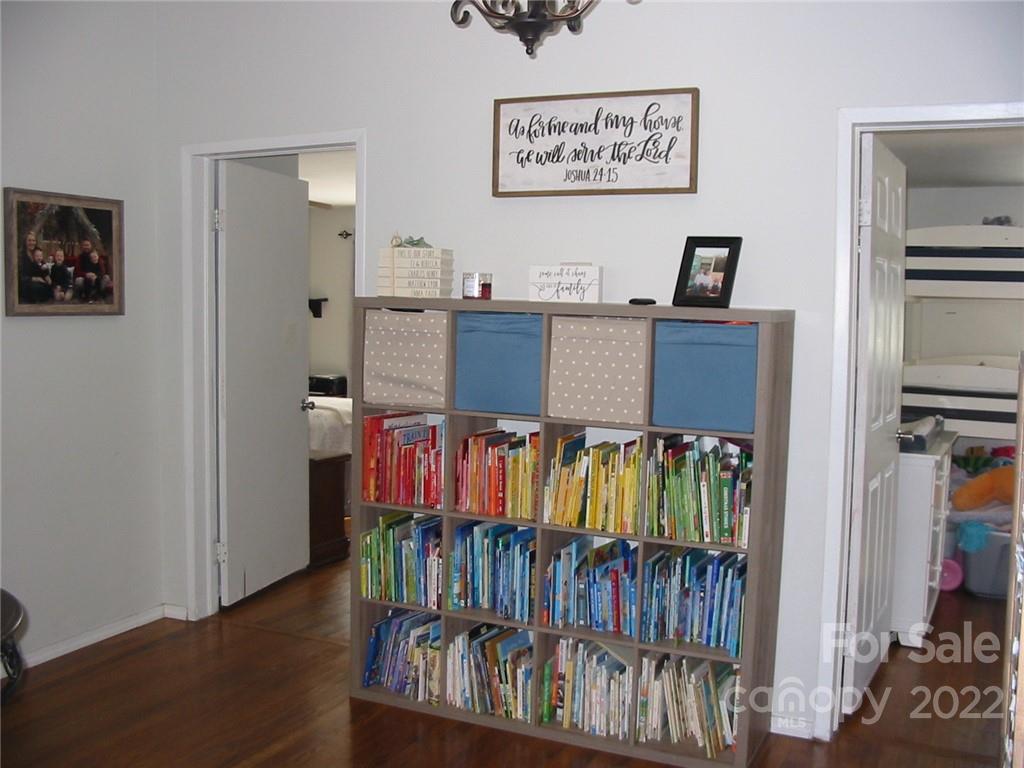 4366 Edgeland Road Edgemoor, SC 29712 - Photo 13 of 37 a living room with furniture and a flat screen tv