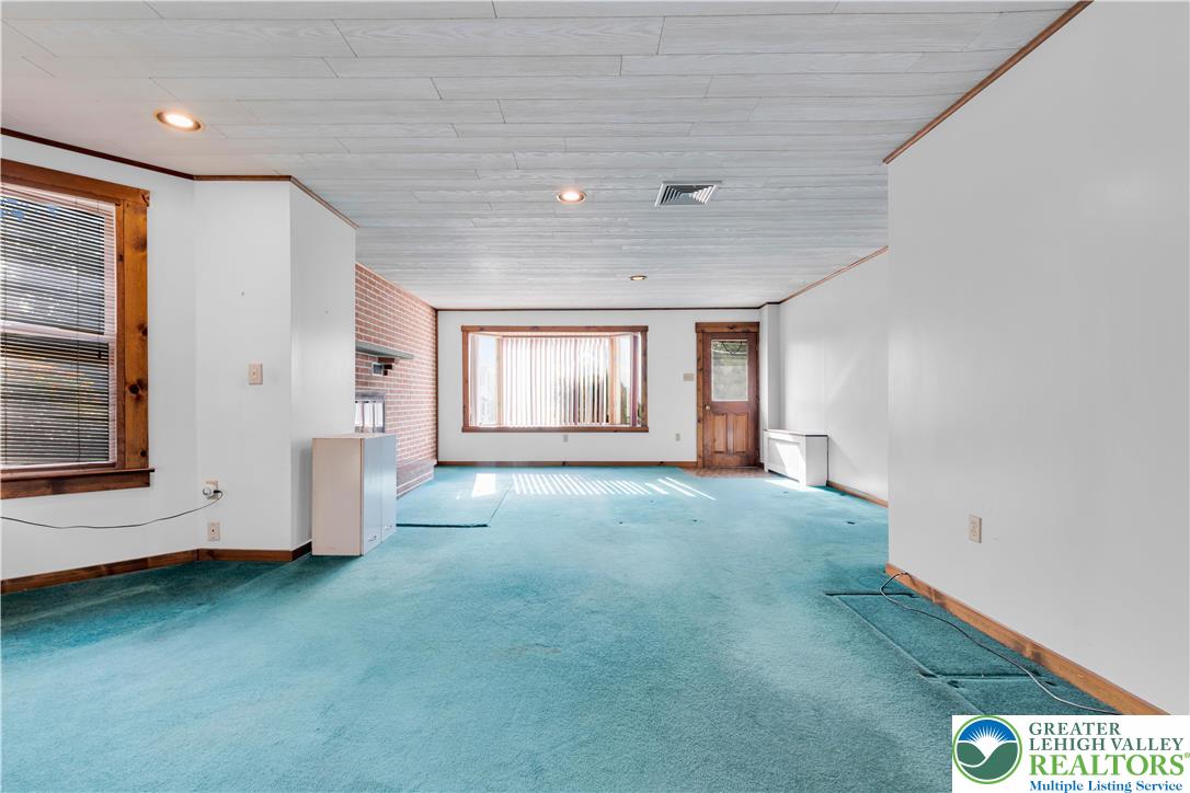 1130 Spring Street Bethlehem, PA 18018 - Photo 19 of 42 a view of an empty room with a window