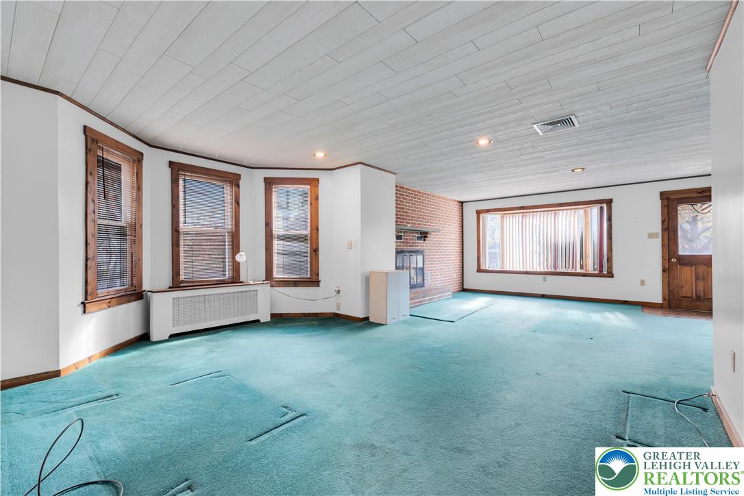 1130 Spring Street Bethlehem, PA 18018 - Photo 20 of 42 a view of an empty room with a window