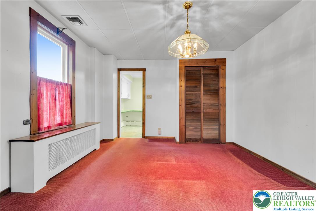 1130 Spring Street Bethlehem, PA 18018 - Photo 21 of 42 a view of an empty room with window and hardwood floor