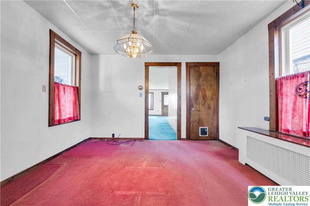 1130 Spring Street Bethlehem, PA 18018 - Photo 22 of 42 a view of an empty room with a window