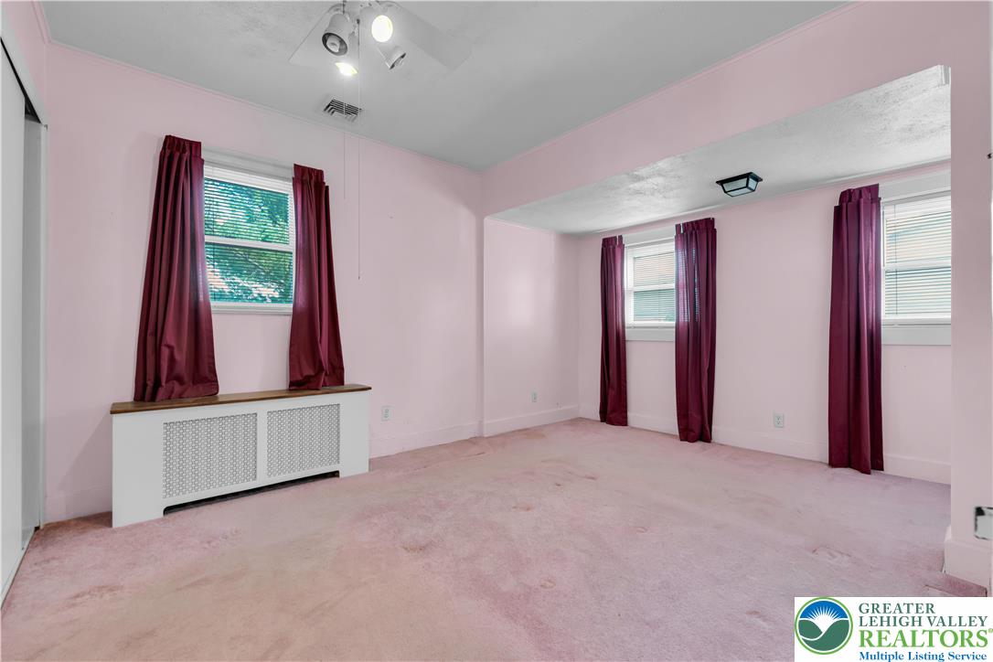 1130 Spring Street Bethlehem, PA 18018 - Photo 29 of 42 a view of an empty room with a window