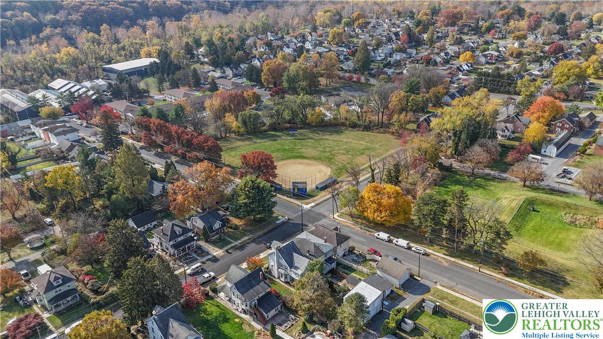 1130 Spring Street Bethlehem, PA 18018 - Photo 7 of 42 an aerial view of residential houses with outdoor space