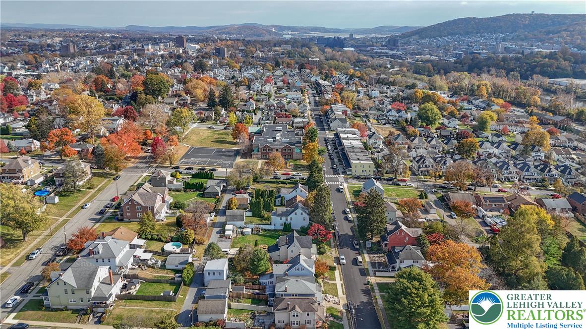 1130 Spring Street Bethlehem, PA 18018 - Photo 9 of 42 an aerial view of residential houses with outdoor space