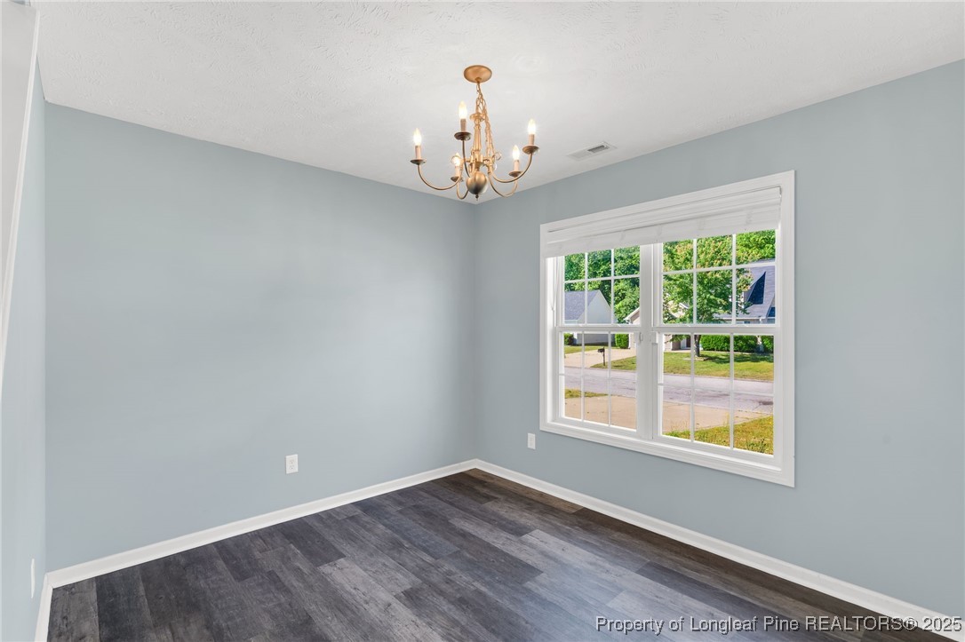 229 Cape Fear Road Raeford, NC 28376 - Photo 6 of 46 a view of an empty room with a window