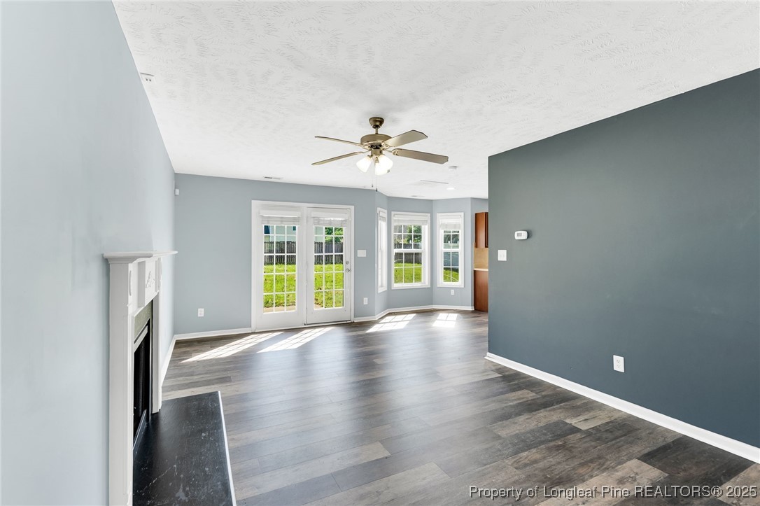 229 Cape Fear Road Raeford, NC 28376 - Photo 9 of 46 wooden floor in an empty room with a window