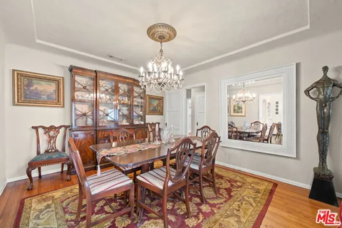 a kitchen with stainless steel appliances a stove a sink and a microwave