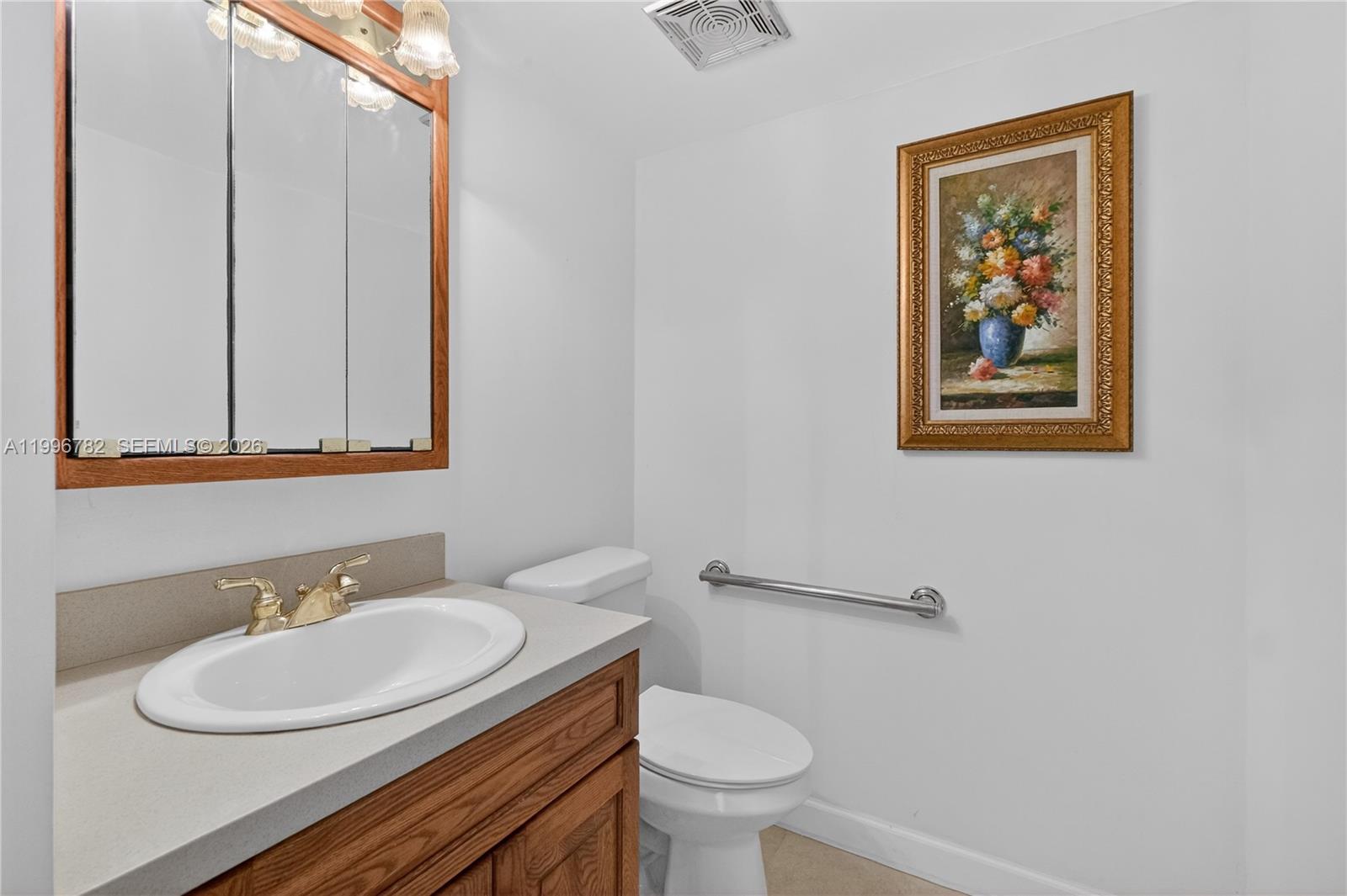 7833 Southwest 102nd Place Miami, FL 33173 - Photo 14 of 51 guest bath