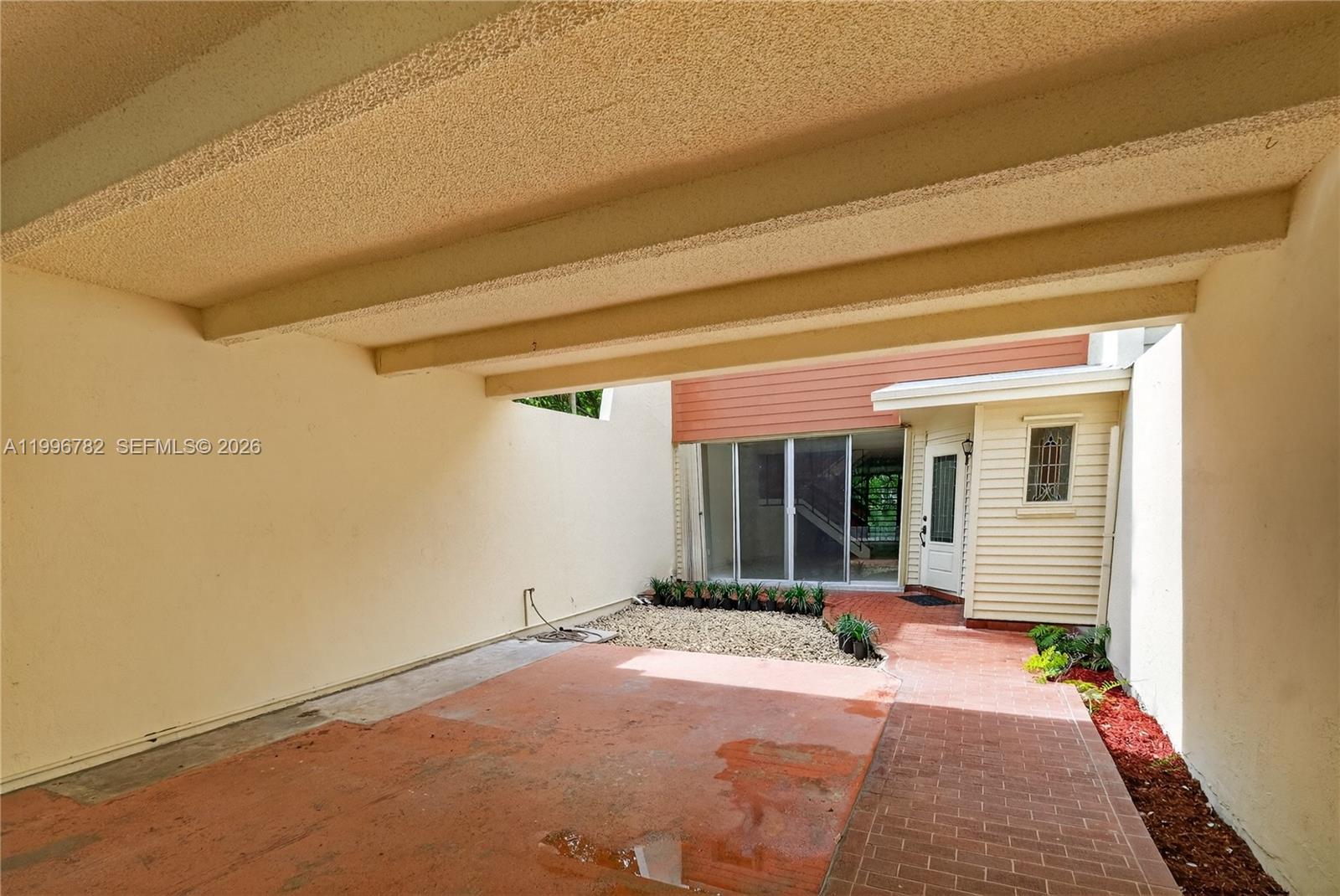 7833 Southwest 102nd Place Miami, FL 33173 - Photo 26 of 51 Front area, patio plus garage