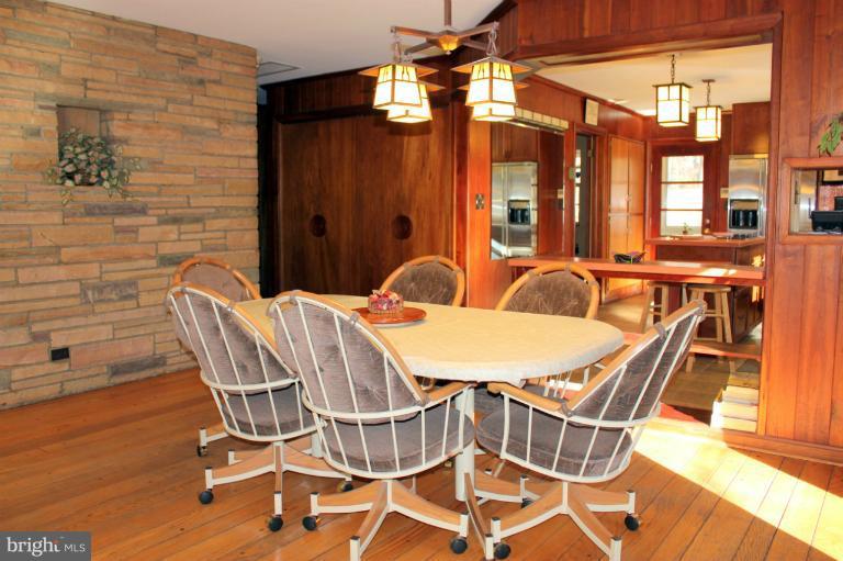 3046 Powder Mill Road Hyattsville, MD 20783 - Photo 12 of 20 a patio with table and chairs