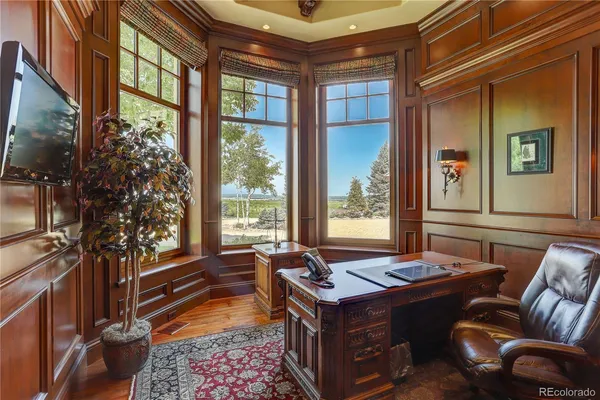 a room with furniture and a window