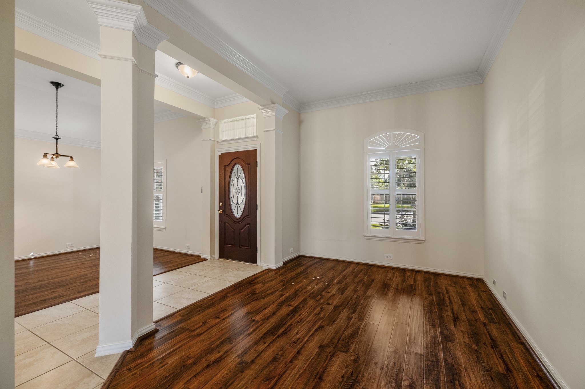20014 Queens Oak Court Spring, TX 77379 - Photo 7 of 49 a view of a room with wooden floor and a window