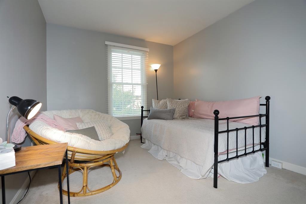 83 Castle View Drive McKees Rocks, PA 15136 - Photo 16 of 25 a bedroom with furniture and a window