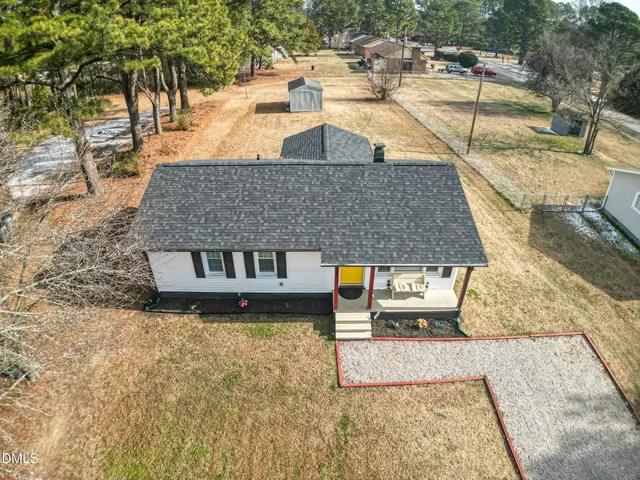 swimming pool view with a outdoor seating